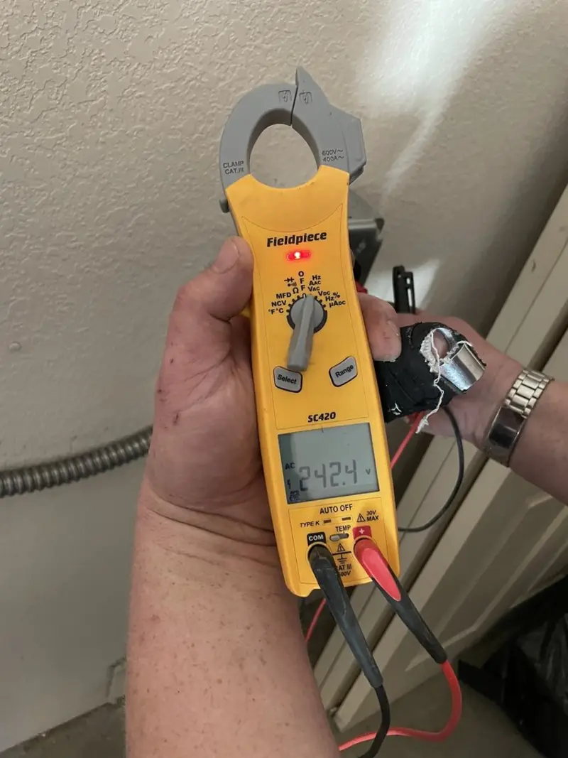 Voltage testing with clamp meter during Hot Tub / Pool Electrical Wiring in Springfield
